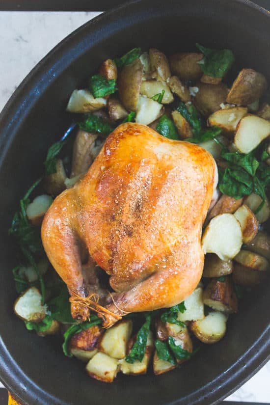 Whole30 roast chicken (based on Thomas Keller's recipe) with the addition of wilted spinach and crispy potatoes that bask in chicken jus. MMMMM