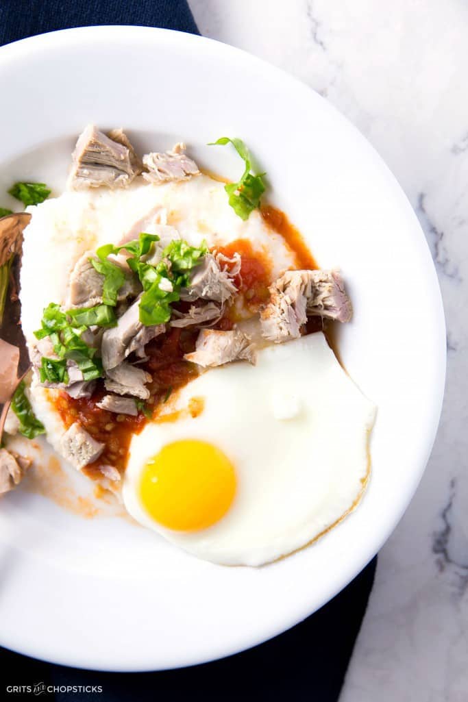Pork and grits with heirloom tomato jam, a fried egg and basil. It's sophisticated Southern in one bite, but easy enough to pull off on a weeknight (with a little advance planning)