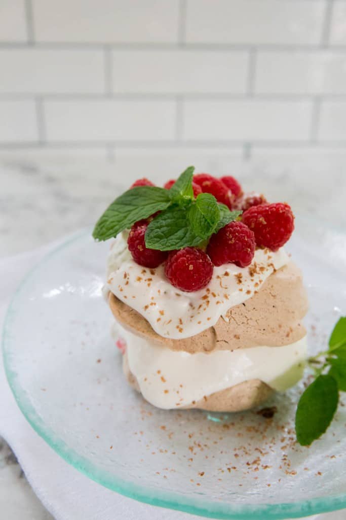 chocolate raspberry pavlovas with whipped cream are an easy, elegant dessert - try it for the holidays!